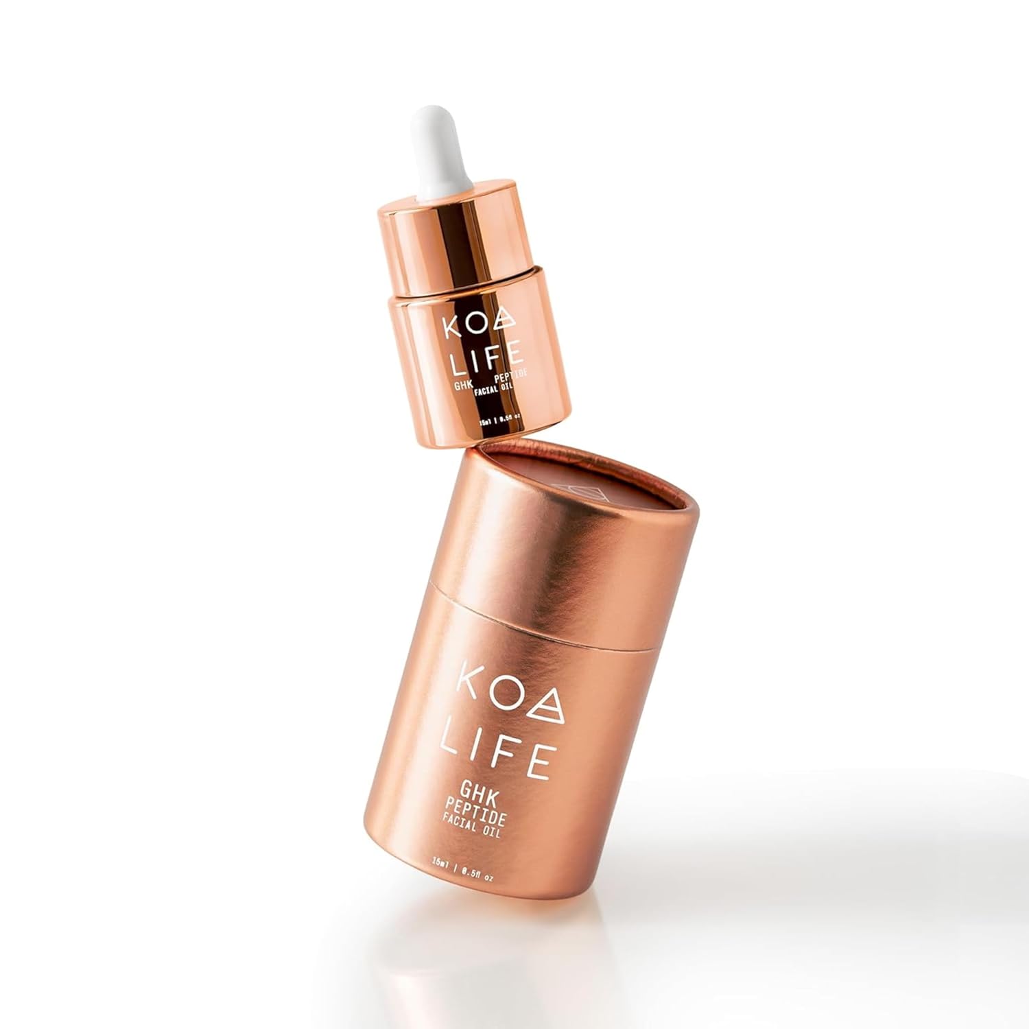 KOA Life GHK Peptide Daily Ultra-Hydrating, Anti-Aging Facial Oil. In a metallic copper glass dropper bottle and metallic copper outer cylinder carton